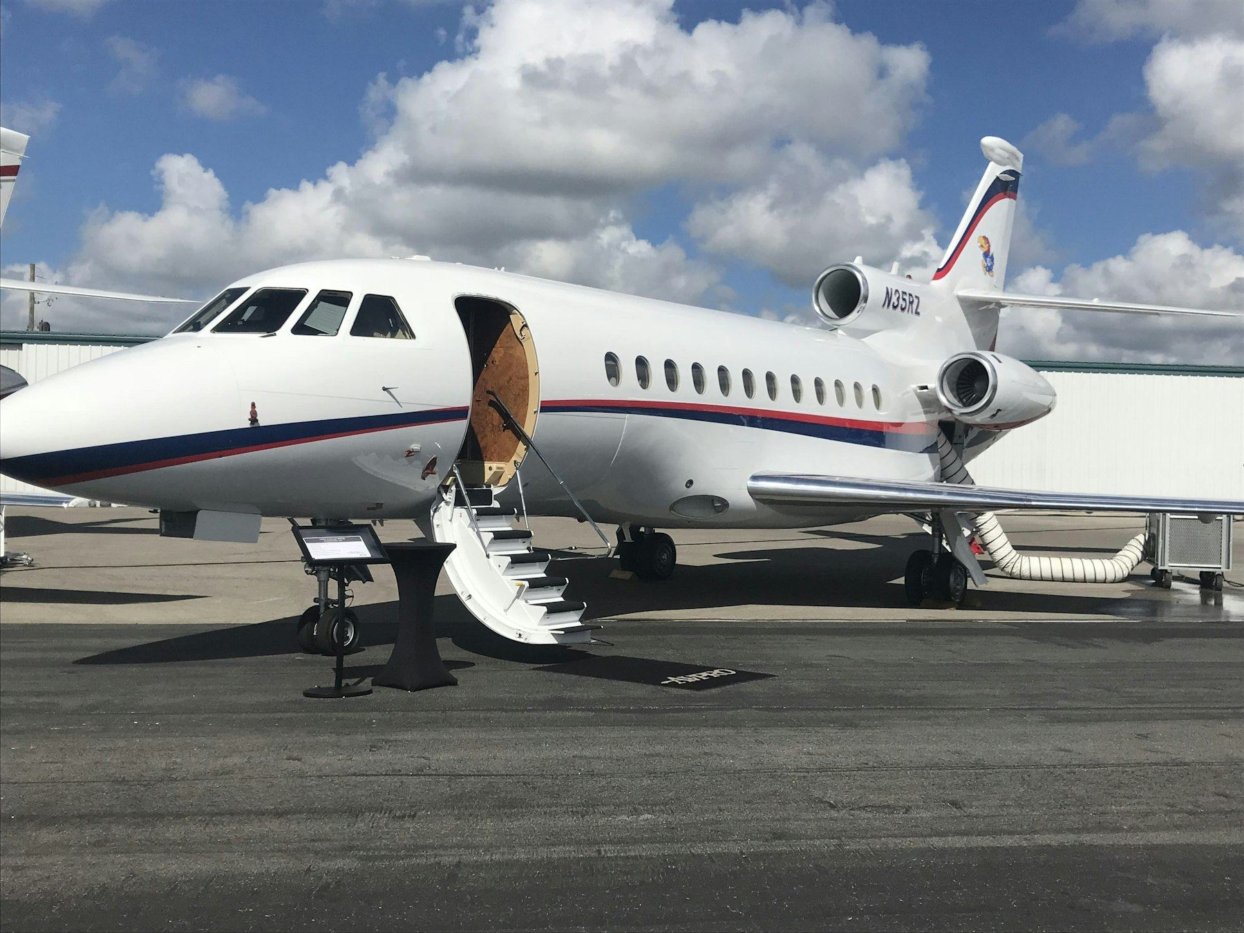 Private jet on the tarmac, detailed by Wanderlust